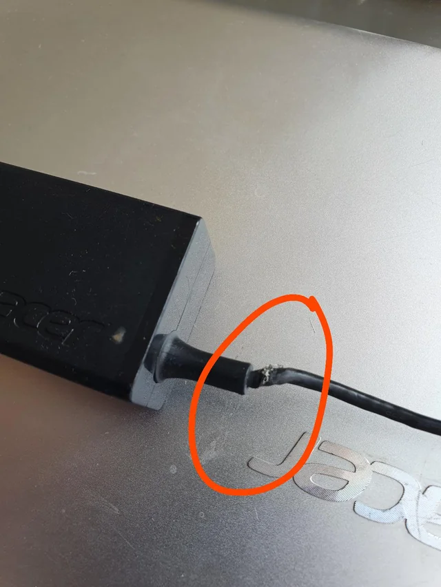 Torn laptop charging wire